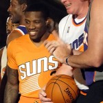 Suns guard Eric Bledsoe models the new alternate orange uniform. (Photo: Vince Marotta/Arizona Sports)