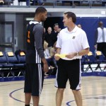 Head coach Jeff Hornacek talks with Marcus Morris. (Photo: Craig Grialou/Arizona Sports)