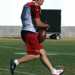 Jay Feely recovers a bouncing kick during practice at their Tempe training facility Thursday, Nov. 14, 2013. (Adam Green/Arizona Sports)