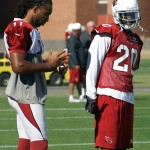 Larry Fitzgerald and Antoine Cason chat during practice at their Tempe training facility Thursday, Nov. 14, 2013. (Adam Green/Arizona Sports)