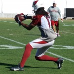 Larry Fitzgerald recovers an onside kick during practice at their Tempe training facility Thursday, Nov. 14, 2013. (Adam Green/Arizona Sports)