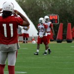 Larry Fitzgerald watches during practice at the team's Tempe training facility Nov. 21, 2013. (Adam Green/Arizona Sports)
