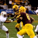 Arizona State's D.J. Foster (8) runs for a first down against Stanford during the NCAA Pac-12 Championship football game on Saturday, Dec. 7, 2013 in Tempe, Ariz. (Photo by Clayton Klapper/KTAR)
