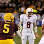 Arizona State's Chris Young (left) lines up against the Stanford offense during the NCAA Pac-12 Championship football game on Saturday, Dec. 7, 2013 in Tempe, Ariz. (Photo by Clayton Klapper/KTAR)