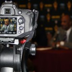 New Vice President for Athletics Ray Anderson can be seen through a camera's viewfinder during his introductory press conference at the Hyatt Regency Resort in Scottsdale, Jan. 9, 2014. (Adam Green/Arizona Sports)