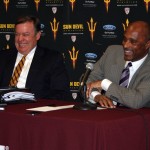ASU President Michael Crow and new VP for Athletics Ray Anderson share a laugh during the latter's introduction at the Hyatt Regency Resort in Scottsdale, Jan. 9, 2014. (Adam Green/Arizona Sports)