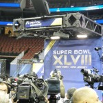 The throng of media gathered early around Denver quarterback Peyton Manning's podium at the annual Super Bowl XLVIII Media Day Tuesday, Jan. 28, 2014 at the Prudential Center in Newark, New Jersey. (Photo: Vince Marotta/Arizona Sports)