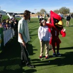 Former Diamondback Randy Johnson hangs out with Cardinals mascot Big Red during the CBS Outdoor Special Olympics Open at the TPC Scottsdale on Jan. 28, 2014. (Craig Grialou/Arizona Sports)