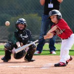 An Ahwatukee Little League hitter makes contact with the ball Saturday at the Salt River Fields in Scottsdale. (Photo courtesy of Jennifer Stewart/Arizona Diamondbacks)