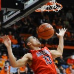 Arizona's Nick Johnson (13) scores against Oregon State during the first half of an NCAA college basketball game in Corvallis, Ore., Wednesday March 5, 2014. (AP Photo/Greg Wahl-Stephens)