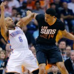 Oklahoma City Thunder guard Derek Fisher (6) is backed down by Phoenix Suns' Gerald Green (14) during the first half of an NBA basketball game, Thursday, March 6, 2014, in Phoenix. (AP Photo/Matt York)