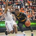 Arizona State's Jahii Carson right, drives past Oregon State's Malcolm Duvivier during the first half of an NCAA college basketball game in Corvallis, Ore., Saturday, March 8, 2014. (AP Photo/Karl Maasdam)