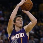 Phoenix Suns' Goran Dragic shoots against the Golden State Warriors during the first half of an NBA basketball game Sunday, March 9, 2014, in Oakland, Calif. (AP Photo/Ben Margot)