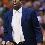 Cleveland Cavaliers' Mike Brown shouts instructions to his players during the first half of an NBA basketball game against the Phoenix Suns, Wednesday, March 12, 2014, in Phoenix. (AP Photo/Ross D. Franklin)