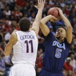 UCLA's Kyle Anderson shoots against Arizona's Aaron Gordon in the second half during the championship game of the NCAA Pac-12 conference college basketball tournament, Saturday, March 15, 2014, in Las Vegas. Anderson was voted Most Outstanding Player. UCLA won 75-71. (AP Photo/Julie Jacobson)