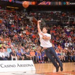 Tim Boven is shown shooting a halfcourt shot for $77,777 -- which was ultimately successful -- during a timeout of a Phoenix Suns-New York Knicks game in Phoenix on Friday, March 28. (Photo courtesy of the Phoenix Suns)