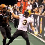 Arizona Rattlers' Jeremy Kellem runs with a receiver during the Rattlers' 73-69 win over the Pittsburgh Power on Saturday at US Airways Center. (Arizona Sports/Clayton Klapper)