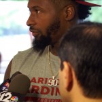Darnell Dockett chats with the media following voluntary workouts at the Tempe facility April 24, 2014. (Adam Green/Arizona Sports)