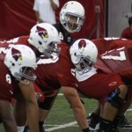 The offense lines up during Arizona Cardinals rookie camp Friday, May 23, at the team's Tempe training facility. (Adam Green/Arizona Sports)