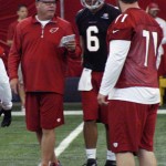Cardinals coach Bruce Arians talks with quarterback Logan Thomas while Anthony Steen looks on during Arizona Cardinals rookie camp Friday, May 23, at the team's Tempe training facility. (Adam Green/Arizona Sports)