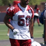 Linebacker Larry Foote runs onto the field during Cardinals minicamp at the Tempe training facility June 10, 2014. (Adam Green/Arizona Sports)