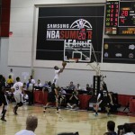 Phoenix Suns forward T.J. Warren lays in an alley-oop pass from guard Tyler Ennis (4) in the first half of an NBA Summer League game against the Minnesota Timberwolves on Wednesday, July 16, 2014. (Arizona Sports photo/Andrew Gilstrap)
