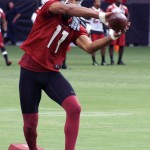 Receiver Larry Fitzgerald catches the ball during Arizona Cardinals training camp July 27, 2014. (Adam Green/Arizona Sports)