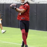 Receiver Larry Fitzgerald makes a catch in the back of the end zone during Arizona Cardinals training camp July 27, 2014. (Adam Green/Arizona Sports)