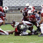 Andre Ellington gets tackled in the pile during Arizona Cardinals training camp July 28, 2014. (Adam Green/Arizona Sports)