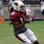 Receiver Kevin Ozier makes a catch during Arizona Cardinals training camp July 29, 2014. (Adam Green/Arizona Sports)