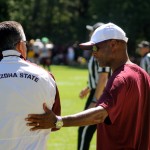 Coach Todd Graham and Athletic Director Ray Anderson greet one another at Sun Devils scrimmage. (Clayton Klapper/Arizona Sports)