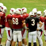 Quarterback Carson Palmer (3) leads the huddle for the first-team offense during Arizona Cardinals training camp at University of Phoenix Stadium in Glendale. (Photo: Vince Marotta/Arizona Sports)