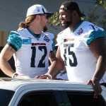 Wide receiver Tysson Poots (12) and offensive lineman Cornelius Dixon (75) take in the sights during the Arizona Rattlers Championship Parade Wednesday, Aug. 26, 2014. (Photo: Vince Marotta/Arizona Sports)