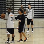 Phoenix Suns assistant coach Mike Longabardi directs players while standing next to point guard Isaiah Thomas during training camp in Flagstaff, Ariz., on Tuesday, Sept. 30, 2014. (Photo: Craig Grialou/Arizona Sports)