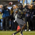 UCLA wide receiver Devin Fuller makes a reception during the first half of an NCAA college football game against Arizona, Saturday, Nov. 1, 2014, in Pasadena, Calif. (AP Photo/Gus Ruelas)