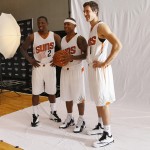 Phoenix Suns' Goran Dragic (1), of Slovenia, Isaiah Thomas, center, and Eric Bledsoe pose for a photo during NBA basketball media day, Monday, Sept. 29, 2014, in Phoenix. (AP Photo/Matt York)