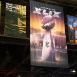 A Super Bowl XLIX banner hangs in Radio Row at the Phoenix Convention Center. (Photo: Vince Marotta/Arizona Sports)