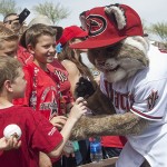 D-backs mascot Baxter signs autographs for young fans. Photo by Stephen DeLorenzo