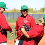Veterans Mark Trumbo (left) and Cody Ross (right) have taken a quick liking to new teammate Yasmany Tomas and his sense of humor. (Photo by Zachary Holland/Cronkite News)