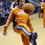 Phoenix Suns point guard Steve Nash warms up before an NBA basketball game against the Washington Wizards, Friday, Jan. 21, 2011, in Washington. (AP Photo/Nick Wass)