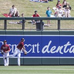 D-backs outfielder Nick Evans fires a ball back in during the first inning. (Photo by Stephen DeLorenzo/Cronkite News)