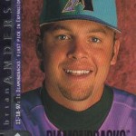 A turquoise hat with a purple bill was used for promotions prior to the Diamondbacks ever taking the field, but the team rarely wore it during its first season. (The Trading Card Database Photo)