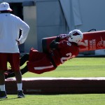 Cornerback Justin Bethel goes through a drill during the team's OTA practice Tuesday, May 19. (Photo by Adam Green/Arizona Sports)