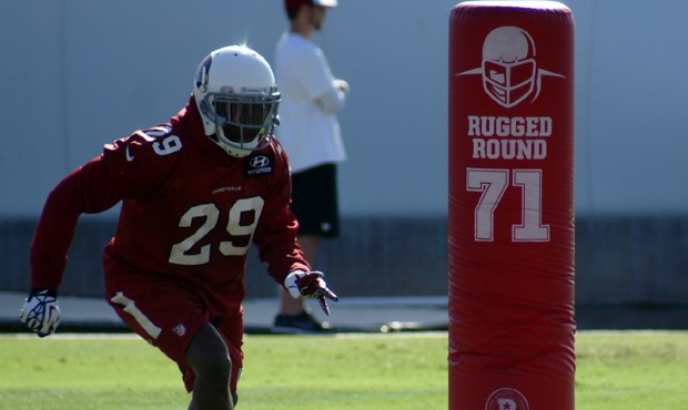 Defensive back Chris Clemons goes through a drill during the team’s OTA practice Tuesday, May...