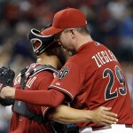 Arizona Diamondbacks' Brad Ziegler (29) hugs catcher Welington Castillo after the final out against the Los Angeles Angels in a baseball game Wednesday, June 17, 2015, in Phoenix. The Diamondbacks defeated the Angels 3-2. (AP Photo/Ross D. Franklin)