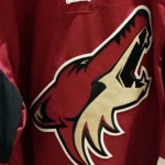 The Coyotes' new home jersey which was unveiled Friday, June 26 at Gila River Arena. The jersey features altered black mid-arm striping and a new secondary paw print logo on each shoulder. (Photo: Paige Dimakos/Arizona Sports)
