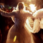 A man wearing a wedding dress and disguised as Medusa takes part in the traditional Night of the Dead celebration in Masaya, just south of Managua, late Friday, Oct. 26, 2007. People dress as monsters and devils, known as "Ahuizotes," which in the indigenous Nahuatl language means "Phantasms near the water," to honor the deaths of indigenous who were killed by Spanish conquerors. (AP Photo/Esteban Felix)
