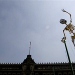 An artwork of a skeleton is seen in Mexico City's Zocalo plaza during Day of the Dead festivities Wednesday, Oct. 31, 2007. Altars and artwork from around the country were on display in the Zocalo, as Mexicans honor Day of the Dead. (AP Photo/Eduardo Verdugo)
