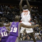 Charlotte Bobcats guard Jason Richardson shoots over Phoenix Suns guard Raja Bell and Leandro Barbosa during the first quarter Tuesday. AP Photo/Chuck Burton