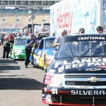 Phoenix International Raceway in Avondale's turning into a city with more than 200,000 people expected for this weekend's NASCAR races. (AP Photo/Rick Scuteri)